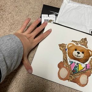 Brand new Moschino cluth. With tag